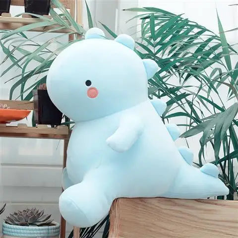 Peluche dino bleu